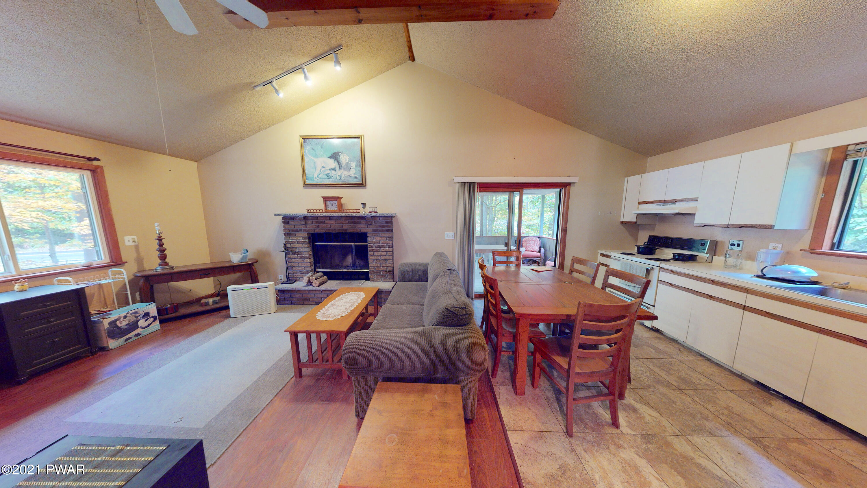 3104 Northgate Road Lake Ariel, PA 18436 - Photo 5 of 25 a living room with furniture and a fireplace