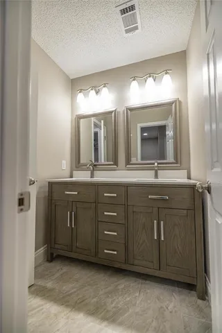 a bathroom with a toilet and a bath tub