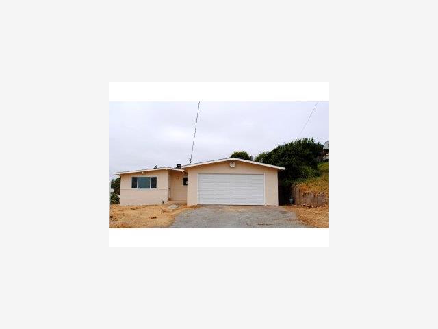 43 Miller Road Watsonville, CA 95076 - Photo 1 of 9 a bathroom with a sink and a mirror