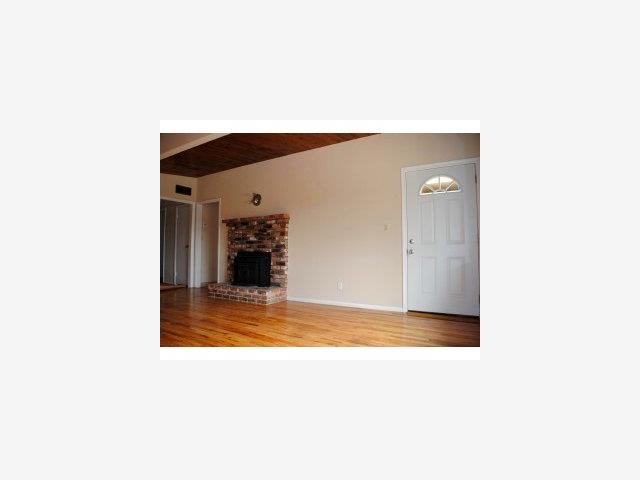 43 Miller Road Watsonville, CA 95076 - Photo 3 of 9 a view of kitchen and hallway with chandelier