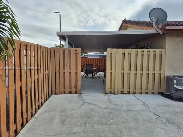 a view of a backyard of a house