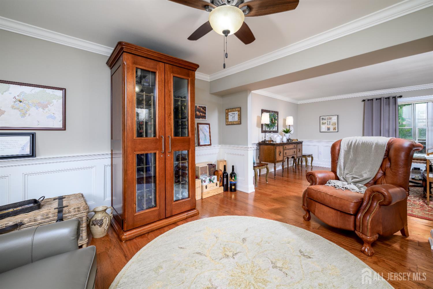 7 Manor Court Old Bridge, NJ 08857 - Photo 11 of 46 a living room with furniture and a chandelier