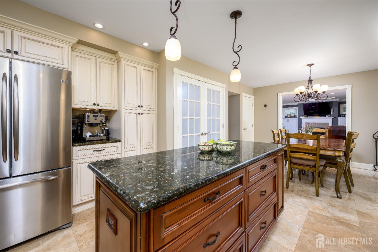 7 Manor Court Old Bridge, NJ 08857 - Photo 14 of 46 a kitchen with stainless steel appliances granite countertop a kitchen island a stove and a refrigerator
