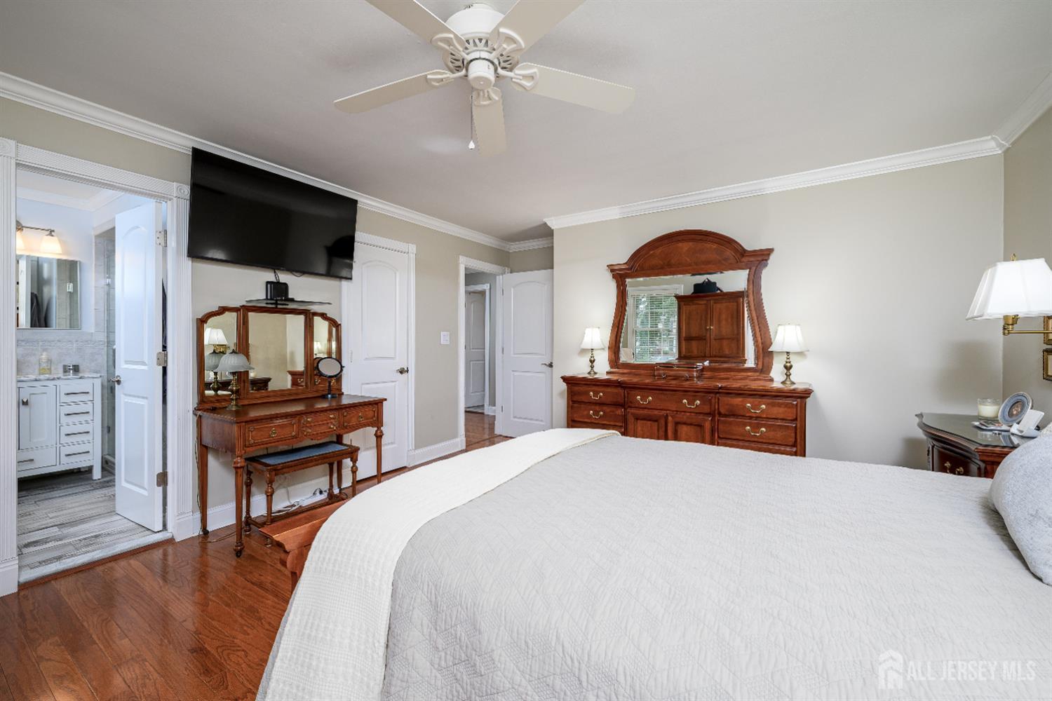 7 Manor Court Old Bridge, NJ 08857 - Photo 24 of 46 a bedroom with a bed and a dresser with the mirror