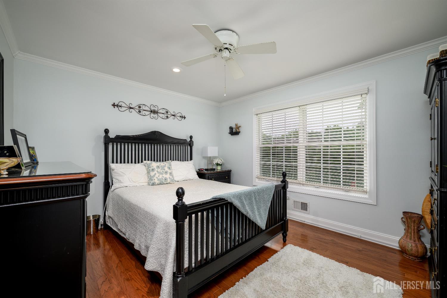7 Manor Court Old Bridge, NJ 08857 - Photo 28 of 46 a bedroom with a bed and a window