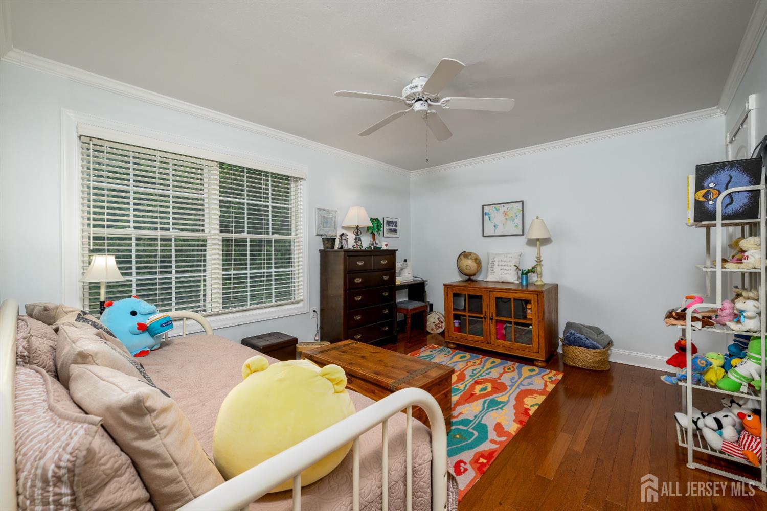 7 Manor Court Old Bridge, NJ 08857 - Photo 34 of 46 a bedroom with furniture and a window
