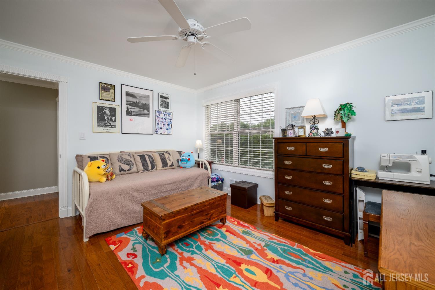 7 Manor Court Old Bridge, NJ 08857 - Photo 35 of 46 a living room with furniture and wooden floor