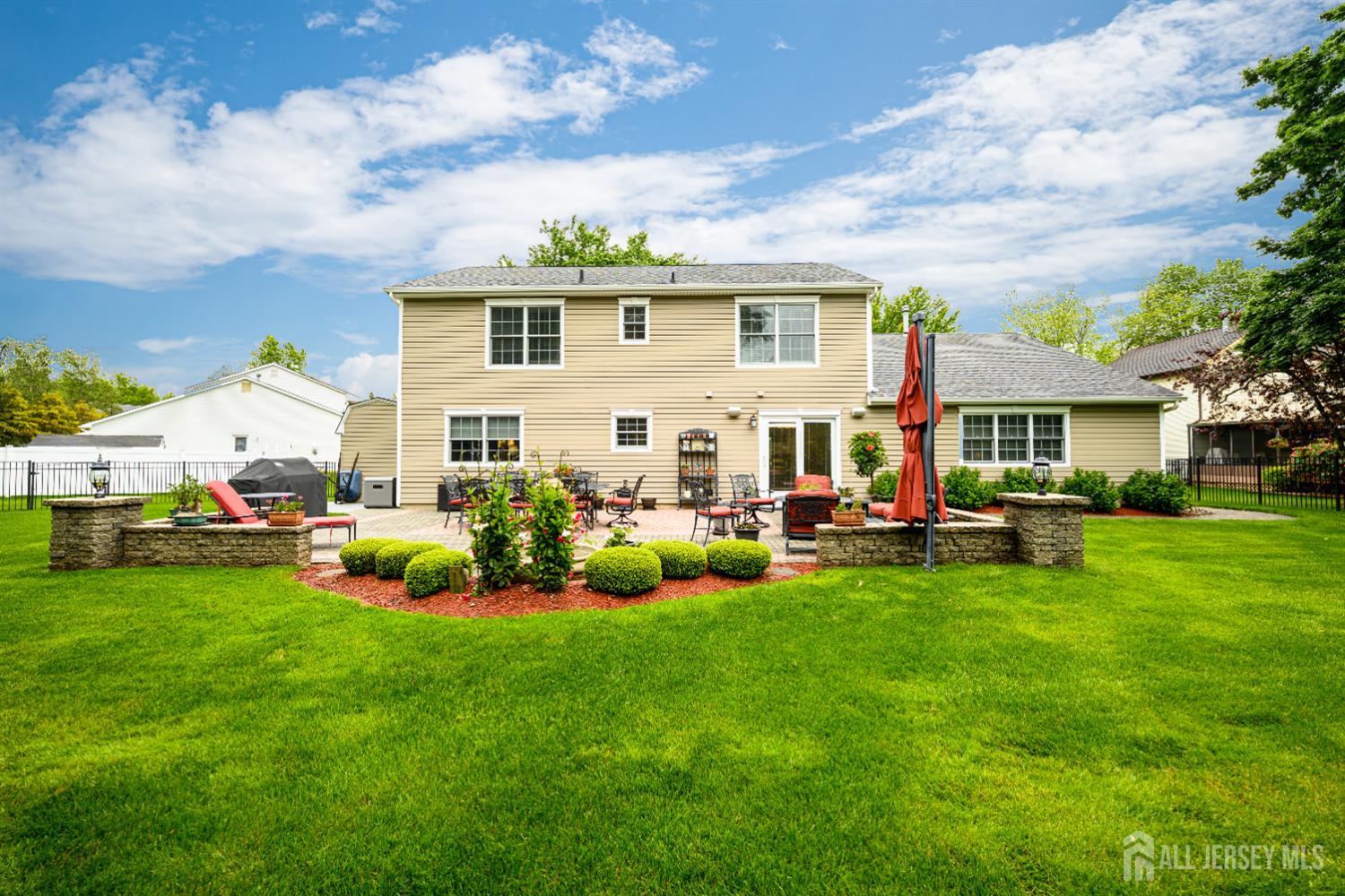 7 Manor Court Old Bridge, NJ 08857 - Photo 39 of 46 a front view of a house with garden and yard