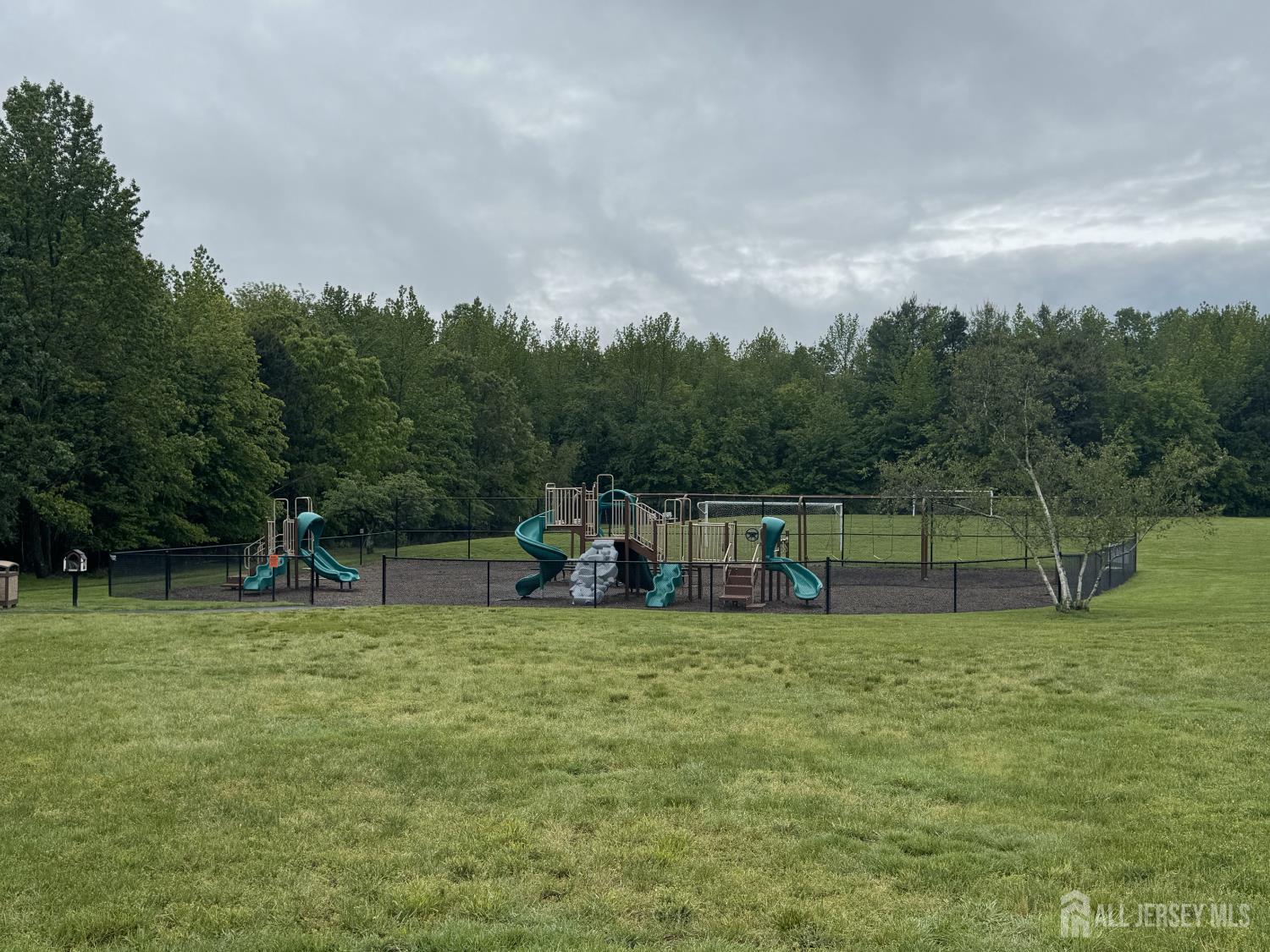 7 Manor Court Old Bridge, NJ 08857 - Photo 44 of 46 a view of a swimming pool with a park