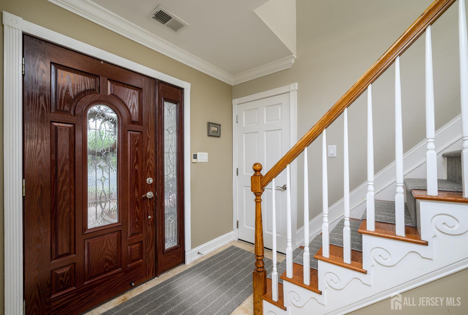 7 Manor Court Old Bridge, NJ 08857 - Photo 5 of 46 a view of an entryway with wooden floor and stairs