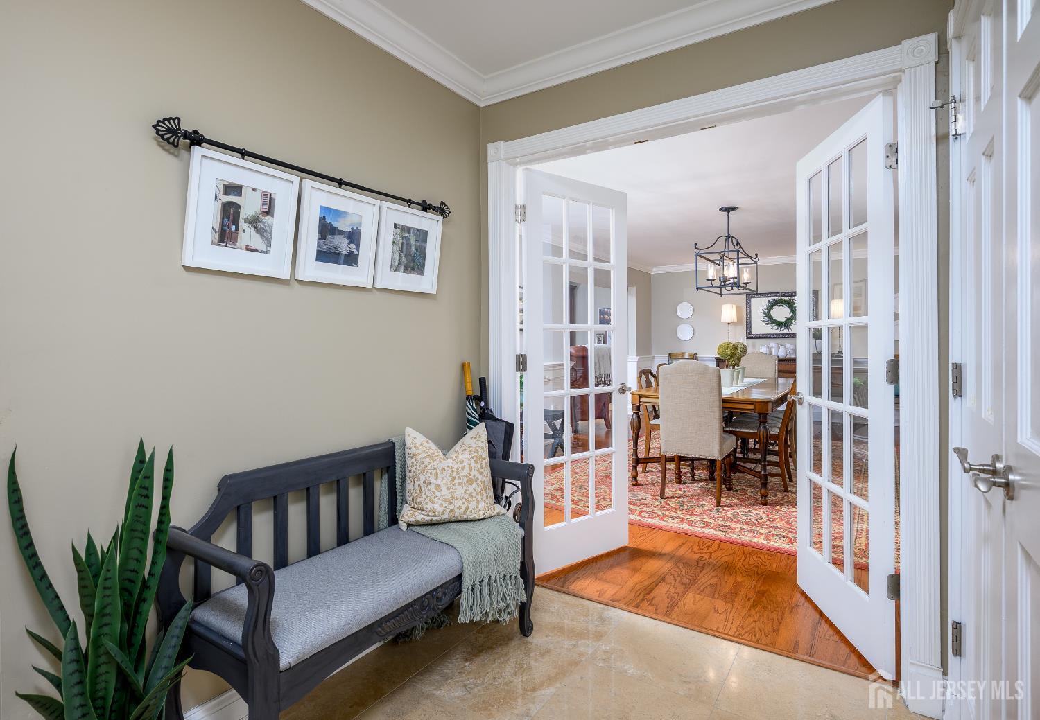 7 Manor Court Old Bridge, NJ 08857 - Photo 6 of 46 a living room with furniture and a painting on the wall