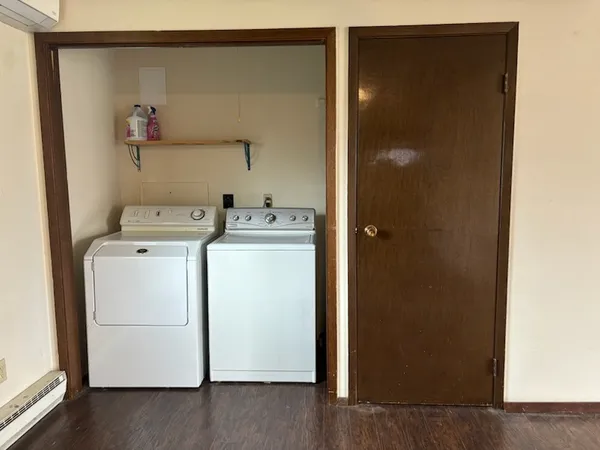 a utility room with dryer and washer