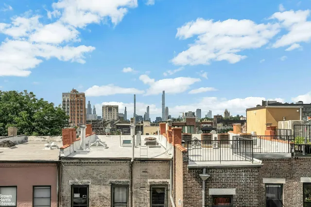 a large building with a city view