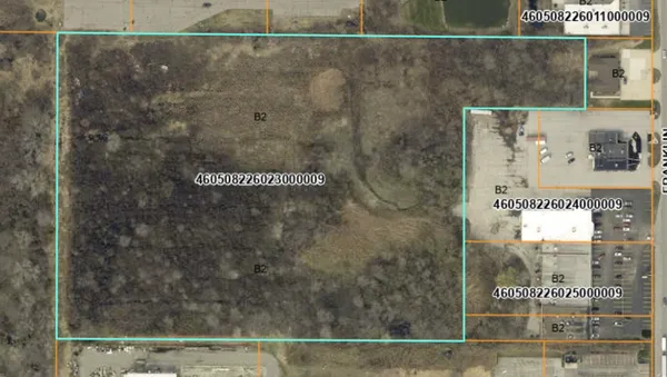 a view of a bathroom with a shower and a sink