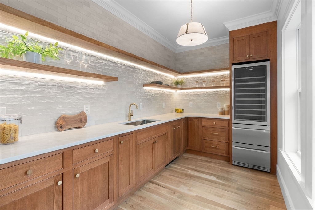 82 Deer Path Lane Weston, MA 02493 - Photo 12 of 42 a kitchen with a sink and cabinets