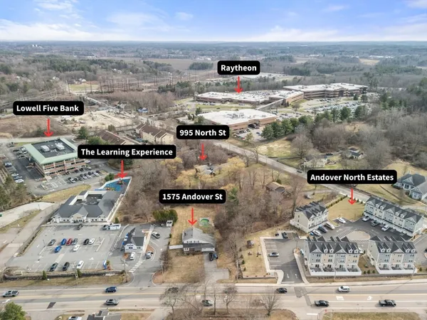 an aerial view of residential building and ocean