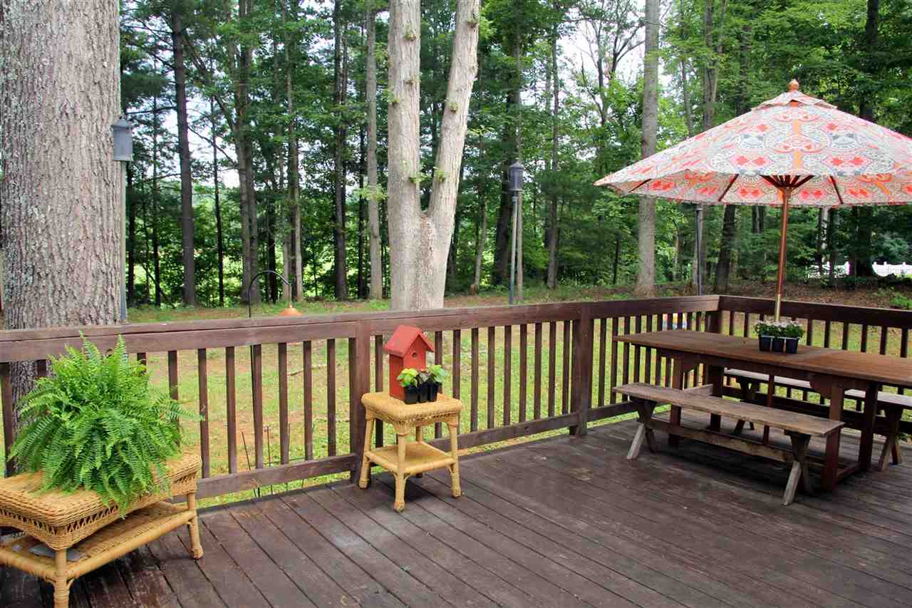 39 Rudolph Street Ruckersville, VA 22968 - Photo 26 of 30 a view of a wooden deck with furniture