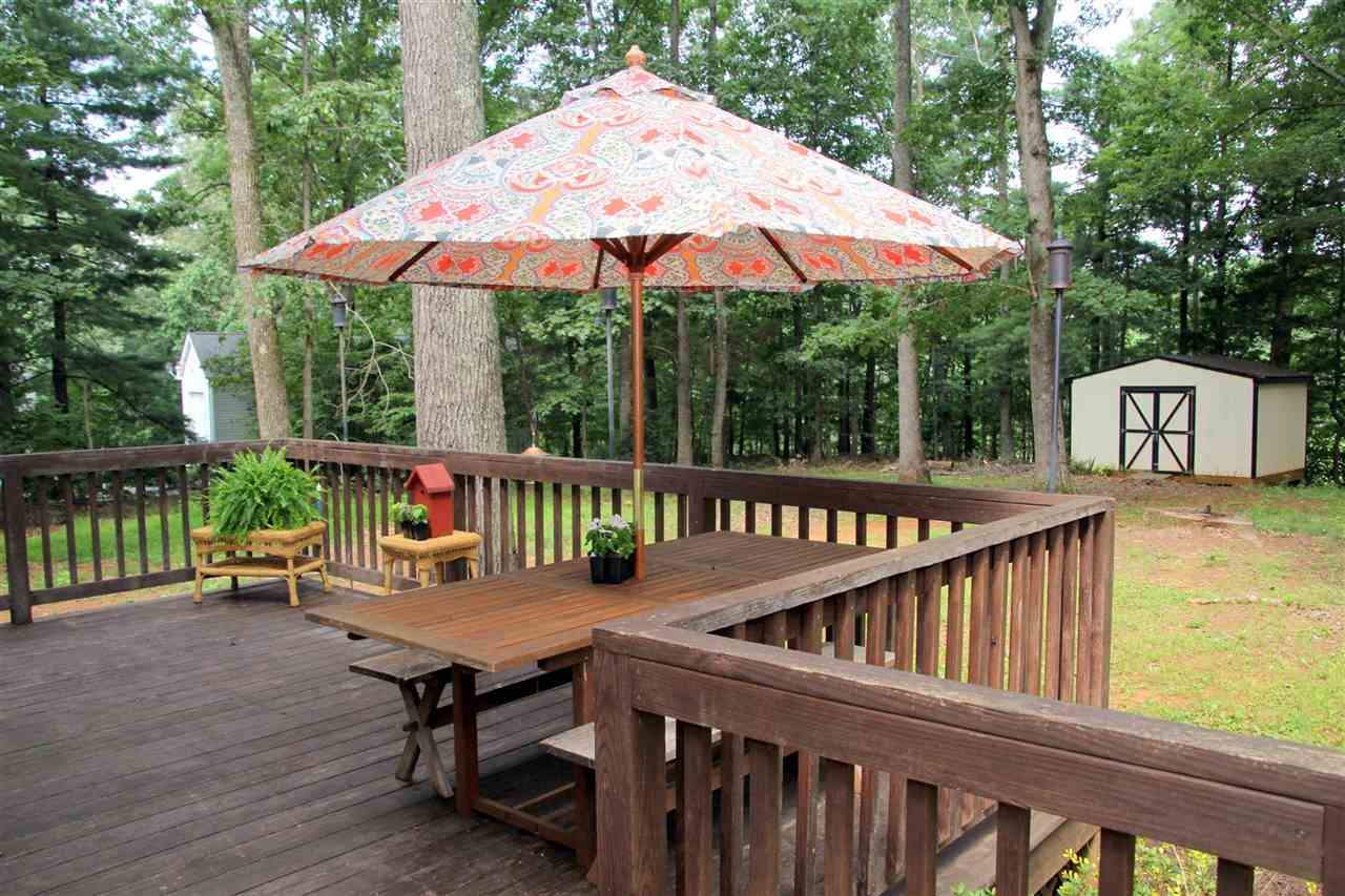39 Rudolph Street Ruckersville, VA 22968 - Photo 27 of 30 a view of a wooden deck with furniture and wooden deck