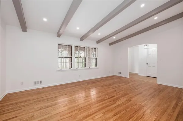 a view of a dining table and chairs in patio