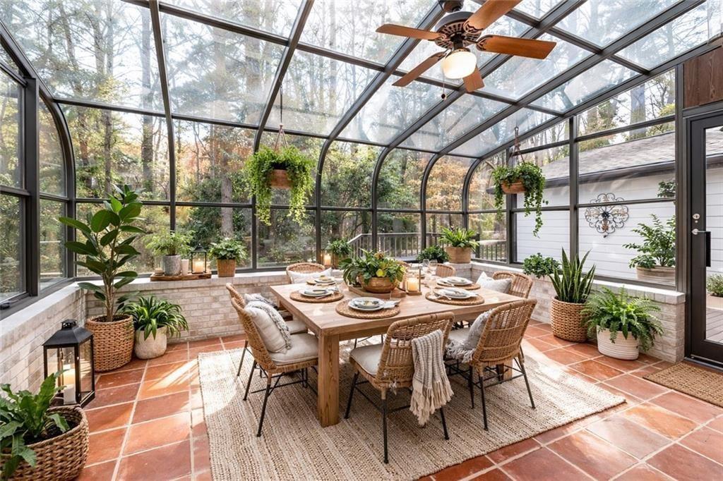 5087 Antelope Lane Smoke Rise, GA 30087 - Photo 18 of 56 a view of a dining table and chairs in patio