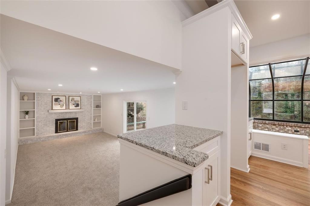 5087 Antelope Lane Smoke Rise, GA 30087 - Photo 21 of 56 a view of living room with furniture and fireplace