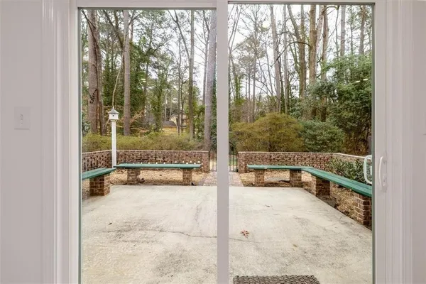 a view of a balcony with wooden floor