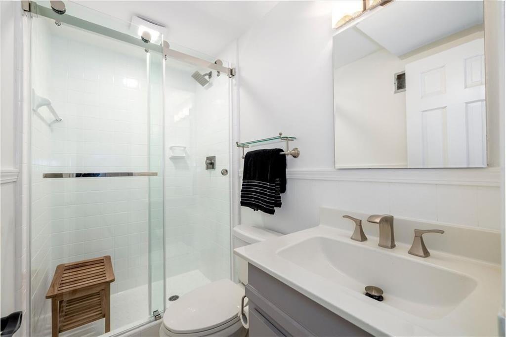 5087 Antelope Lane Smoke Rise, GA 30087 - Photo 26 of 56 a bathroom with a sink toilet and shower