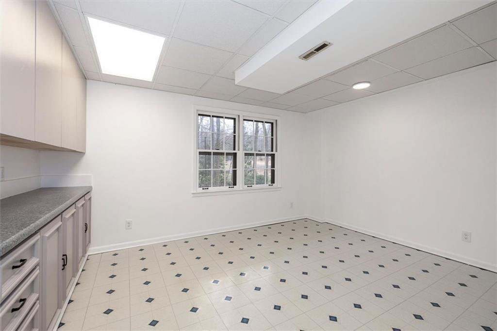 5087 Antelope Lane Smoke Rise, GA 30087 - Photo 29 of 56 a view of an empty room and window