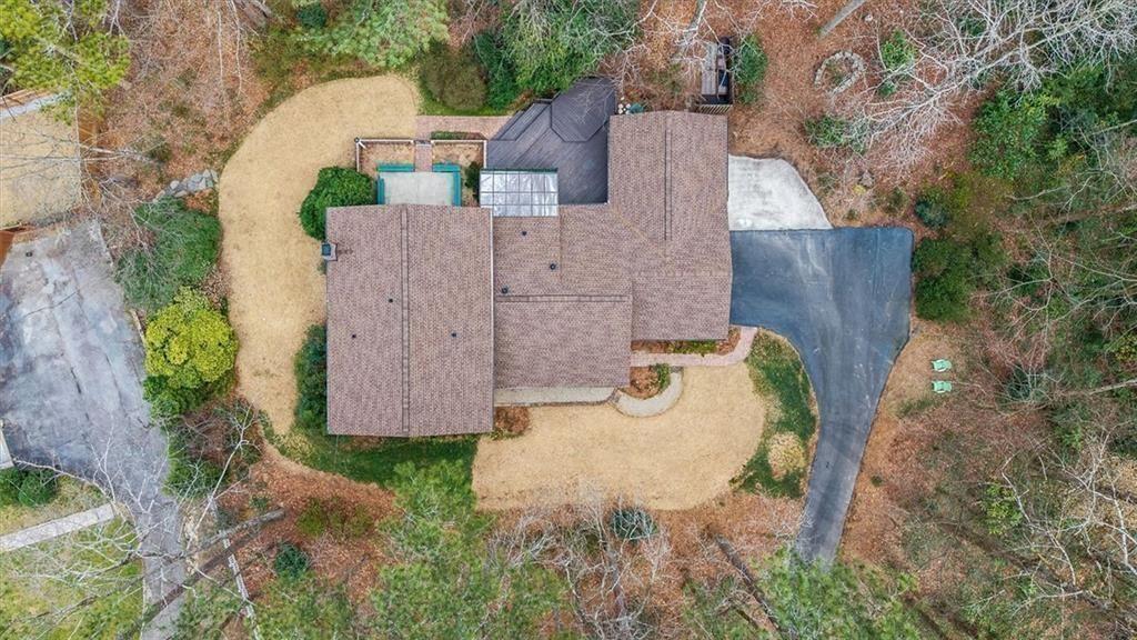 5087 Antelope Lane Smoke Rise, GA 30087 - Photo 3 of 56 an aerial view of a house with outdoor space
