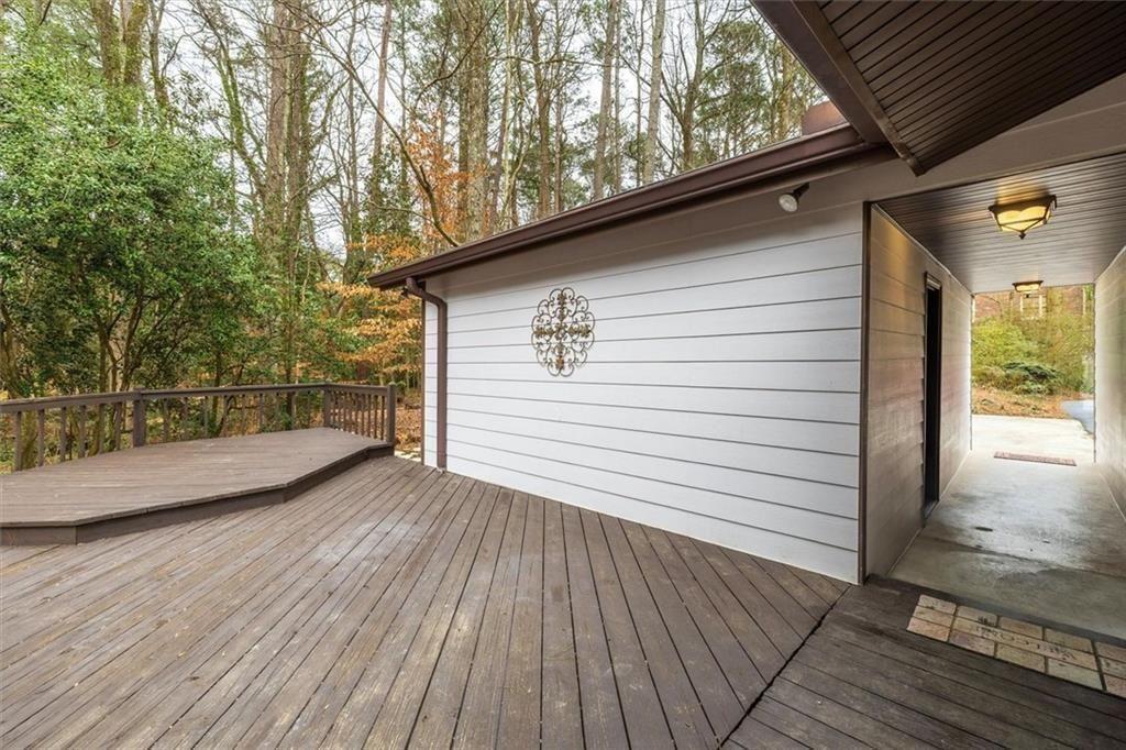 5087 Antelope Lane Smoke Rise, GA 30087 - Photo 45 of 56 a view of a balcony with wooden floor