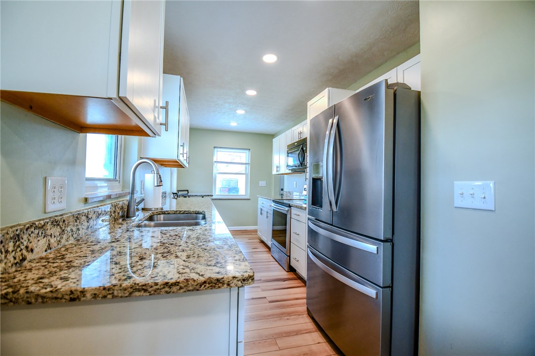 816 South Smithville Road Dayton, OH 45403 - Photo 11 of 33 This modern kitchen features sleek appliances and ample counter space.