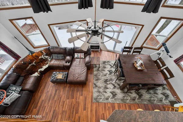 a view of swimming pool with seating area