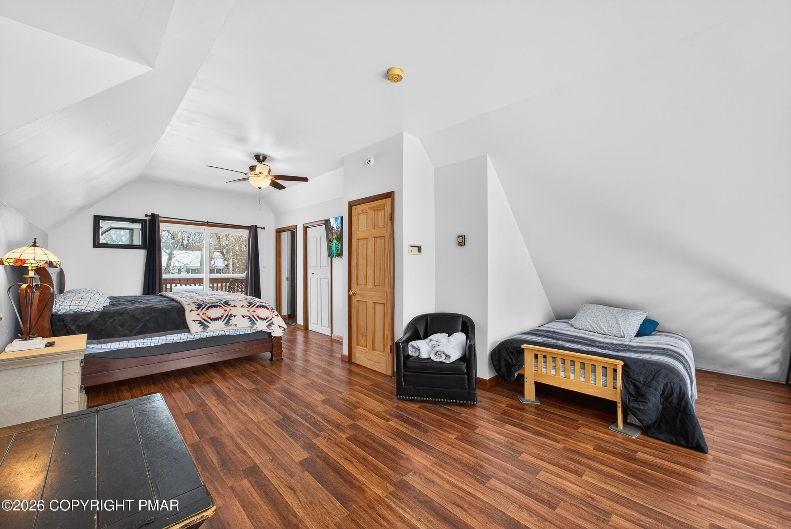 3112 Spring Court Bushkill, PA 18324 - Photo 32 of 52 a living room with furniture and a wooden floor