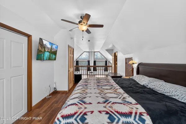 a view of staircase with lots of wooden floor