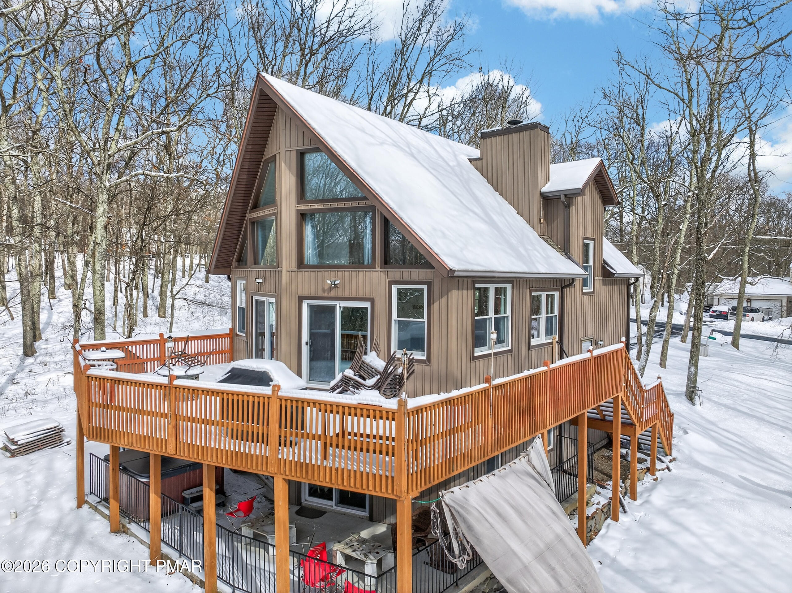 3112 Spring Court Bushkill, PA 18324 - Photo 47 of 52 a view of house with outdoor space and wooden deck