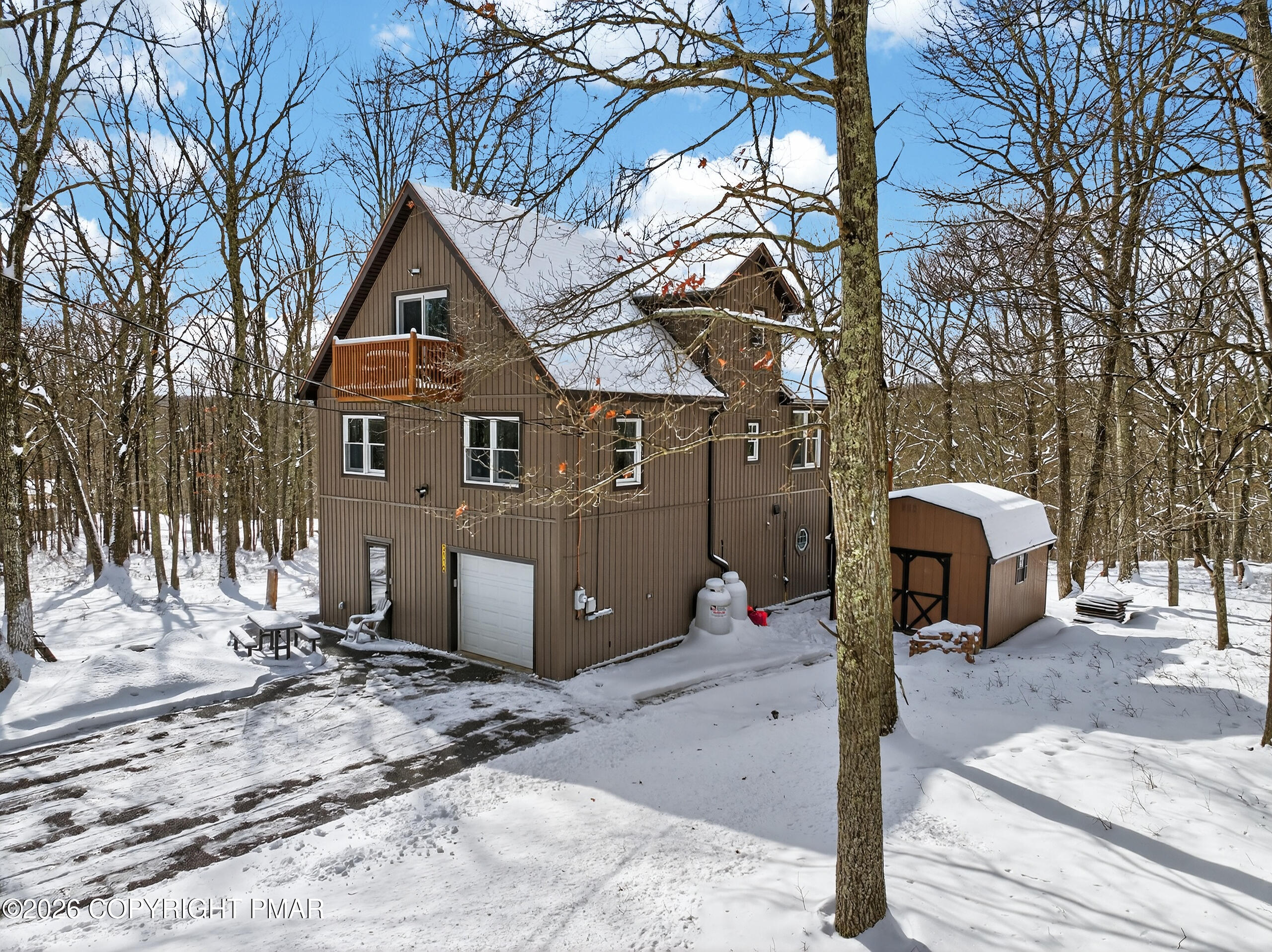 3112 Spring Court Bushkill, PA 18324 - Photo 6 of 52 a front view of a house with parking area
