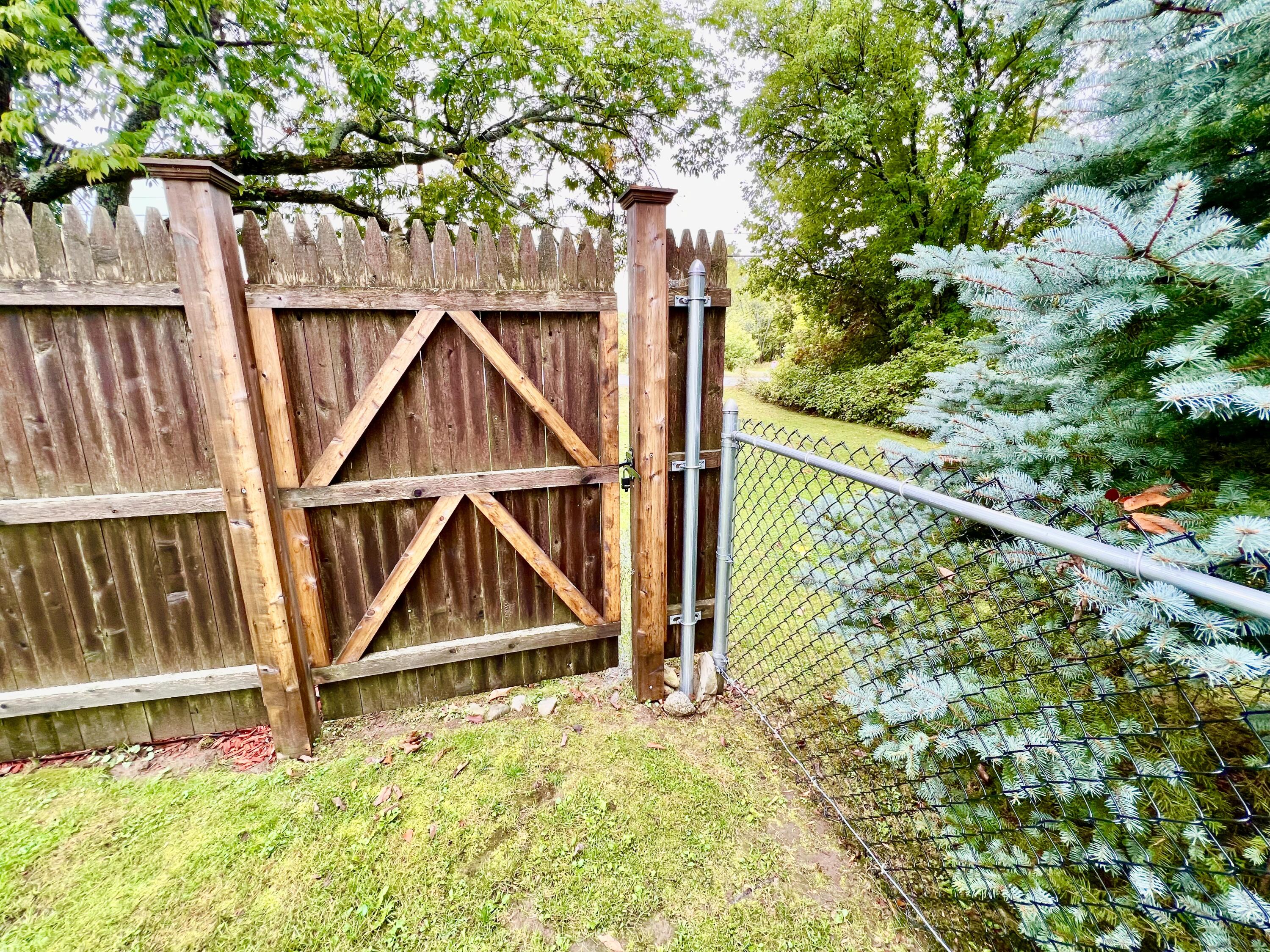18 County Road Milford, ME 04461 - Photo 55 of 153 Fence Door to Front Yard
