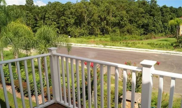 a view of a wooden fence