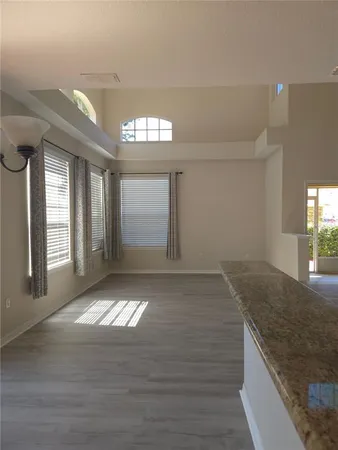 a view of an empty room and window