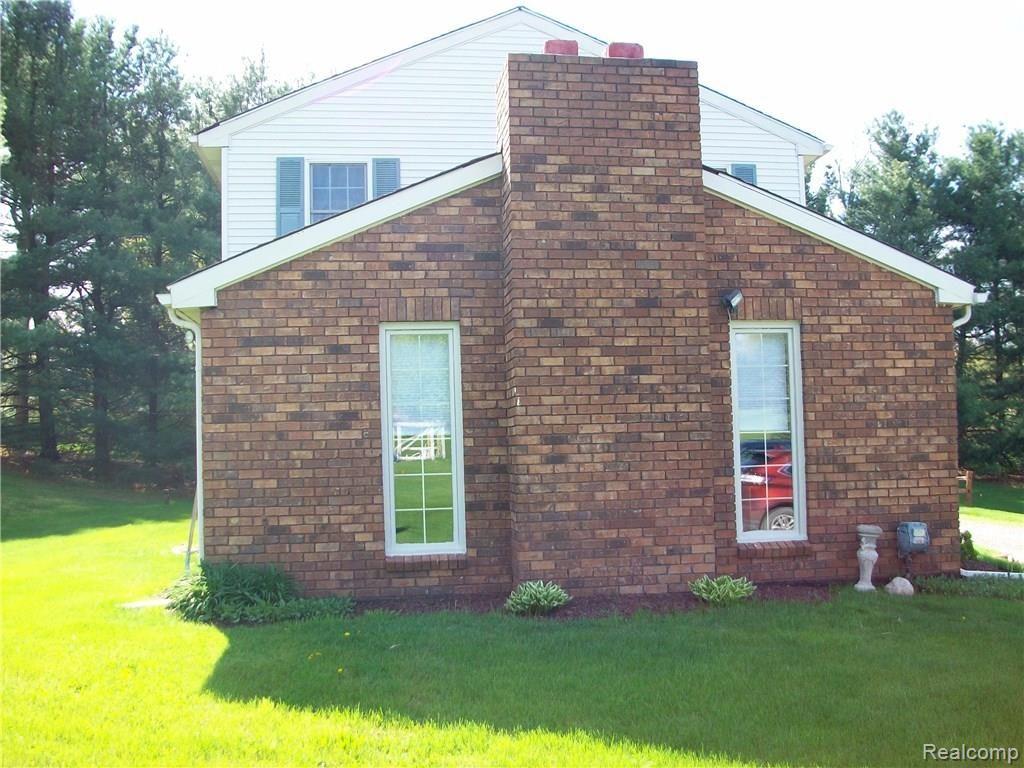 420 Mack Road Leonard, MI 48367 - Photo 32 of 37 100_2414.JPG