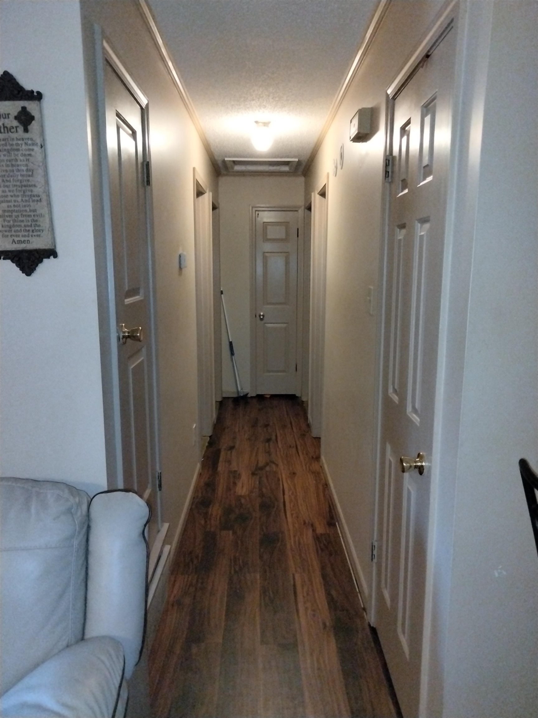 6514 Falling Mist Lane Memphis, TN 38141 - Photo 11 of 21 a view of a hallway with wooden floor