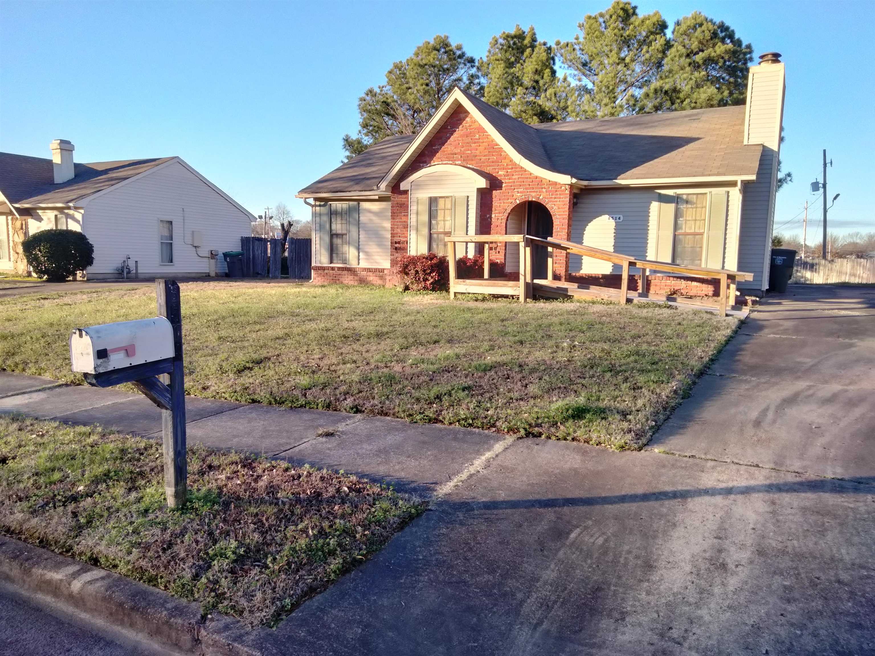 6514 Falling Mist Lane Memphis, TN 38141 - Photo 21 of 21 a front view of a house with a yard