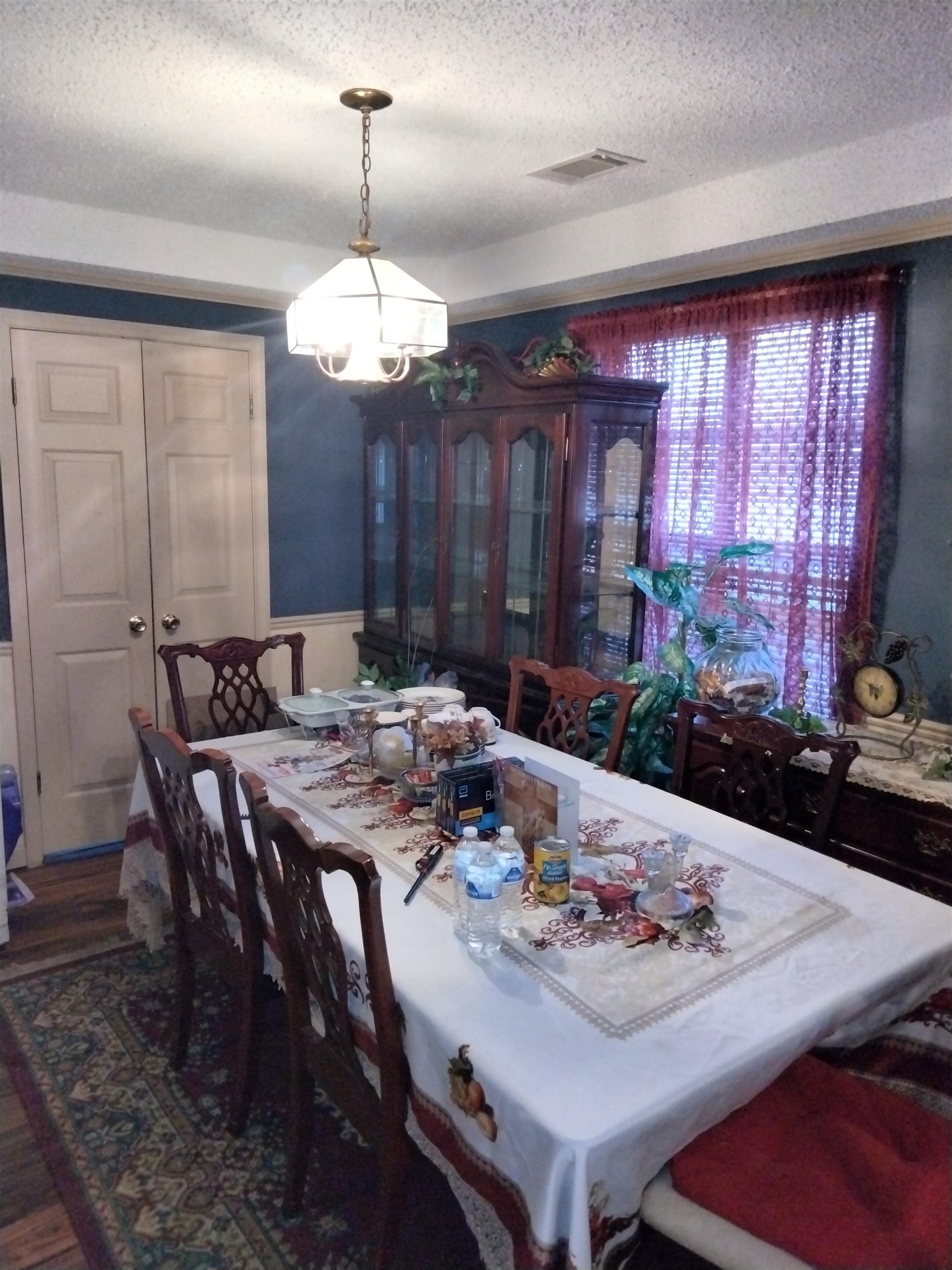 6514 Falling Mist Lane Memphis, TN 38141 - Photo 7 of 21 a view of a dining room with furniture window and wooden floor