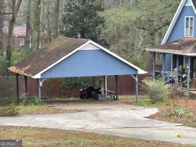 3055 Spot Road Cumming, GA 30040 - Photo 6 of 6 a view of a house with backyard and sitting area