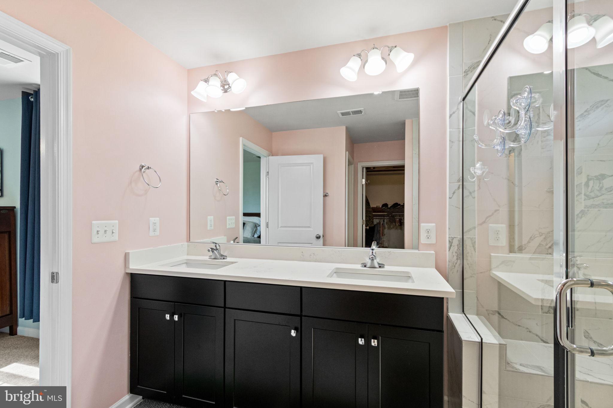 995 Aspen Road Stafford, VA 22554 - Photo 20 of 39 Primary bath with dual vanity and walk in shower