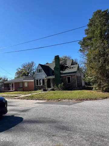 a house view with a outdoor space