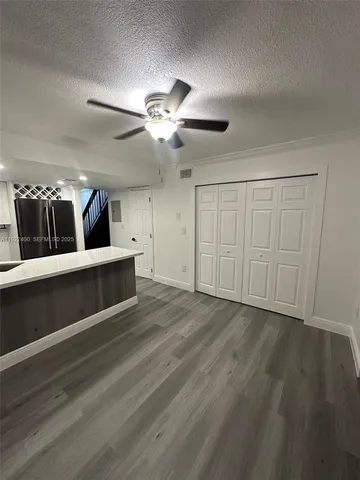 a view of a storage & utility room with closet
