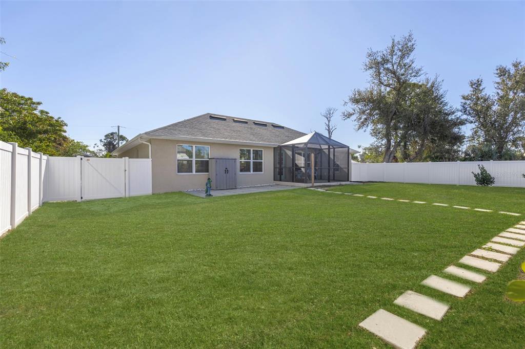 8049 Dimstead Street Port Charlotte, FL 33981 - Photo 14 of 39 a front view of house with yard and green space