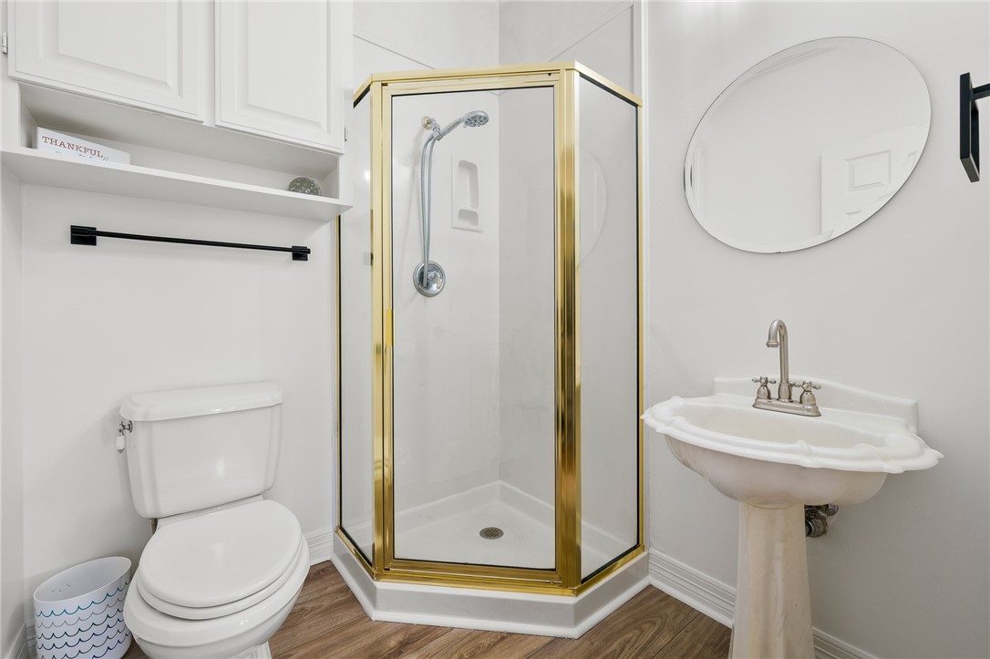 2 Schendel Road Portland, TX 78374 - Photo 19 of 39 a bathroom with a sink a toilet and shower