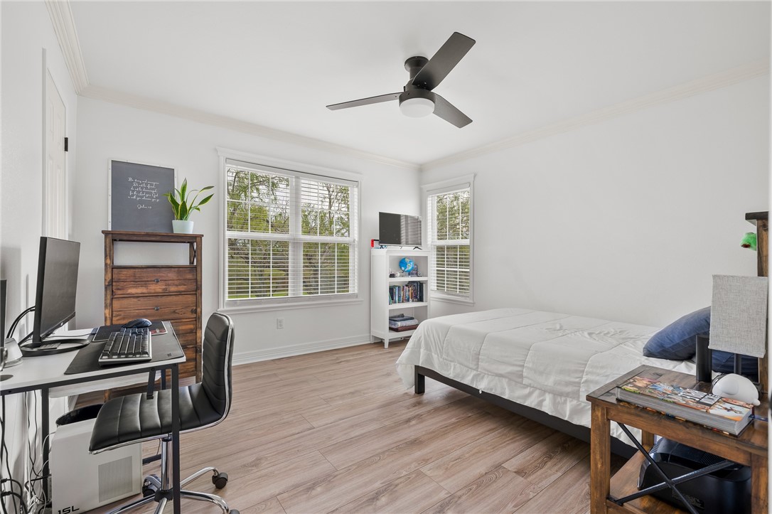 2 Schendel Road Portland, TX 78374 - Photo 29 of 39 a bedroom with bed tv and window